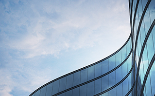 glass building and sky